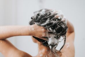 shutterstock 2247060901 295x197 - Woman,Washing,Hair,With,Shampoo,And,Shower,In,Bathroom,,Asian