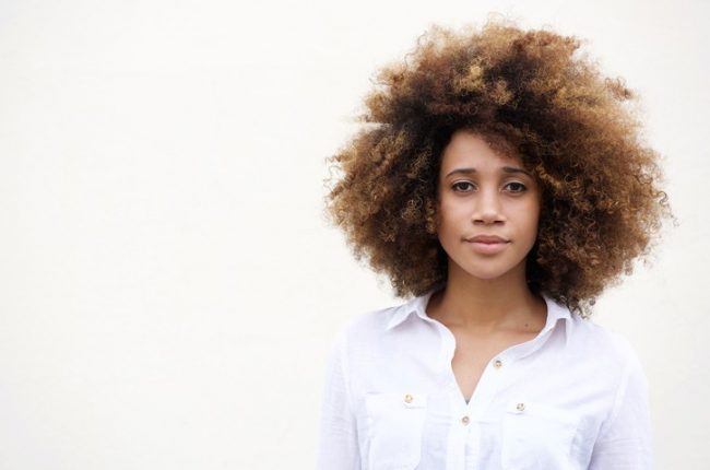 One african american woman with curly hair