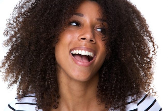 Young african american woman laughing