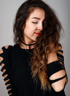 iStock 879294214 295x403 - Beautiful Young Woman