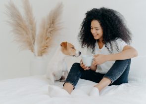 shutterstock 1905433972 295x211 - Horizontal,Shot,Of,Happy,Afro,American,Woman,Spends,Leisure,Time